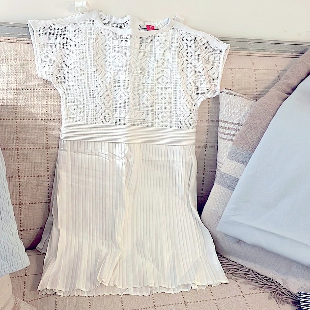 Madewell White Crochet Top, complimented by chic tennis style bottom.